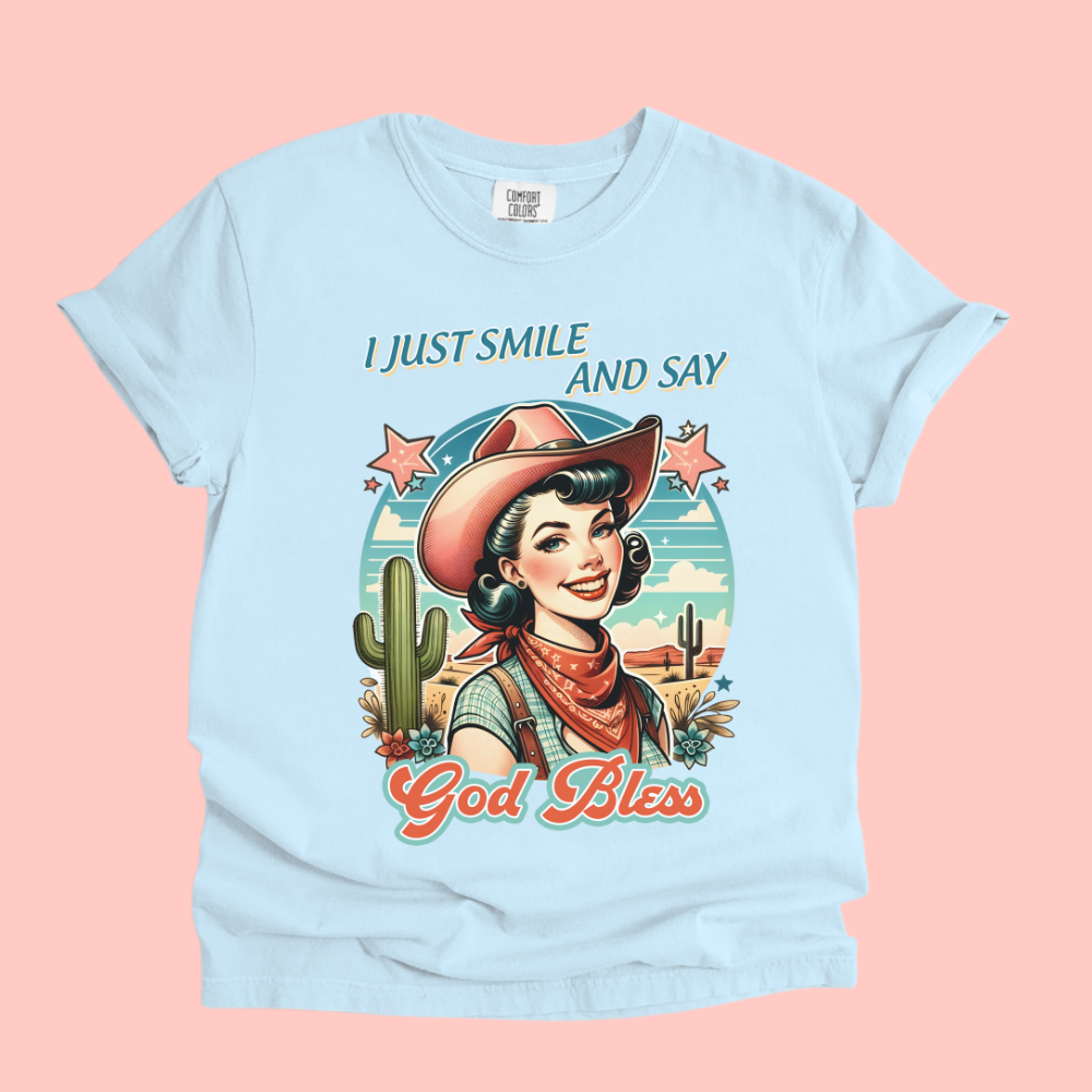 I JUST SMILE AND SAY GOD BLESS TEE - FANGIRL SWAG