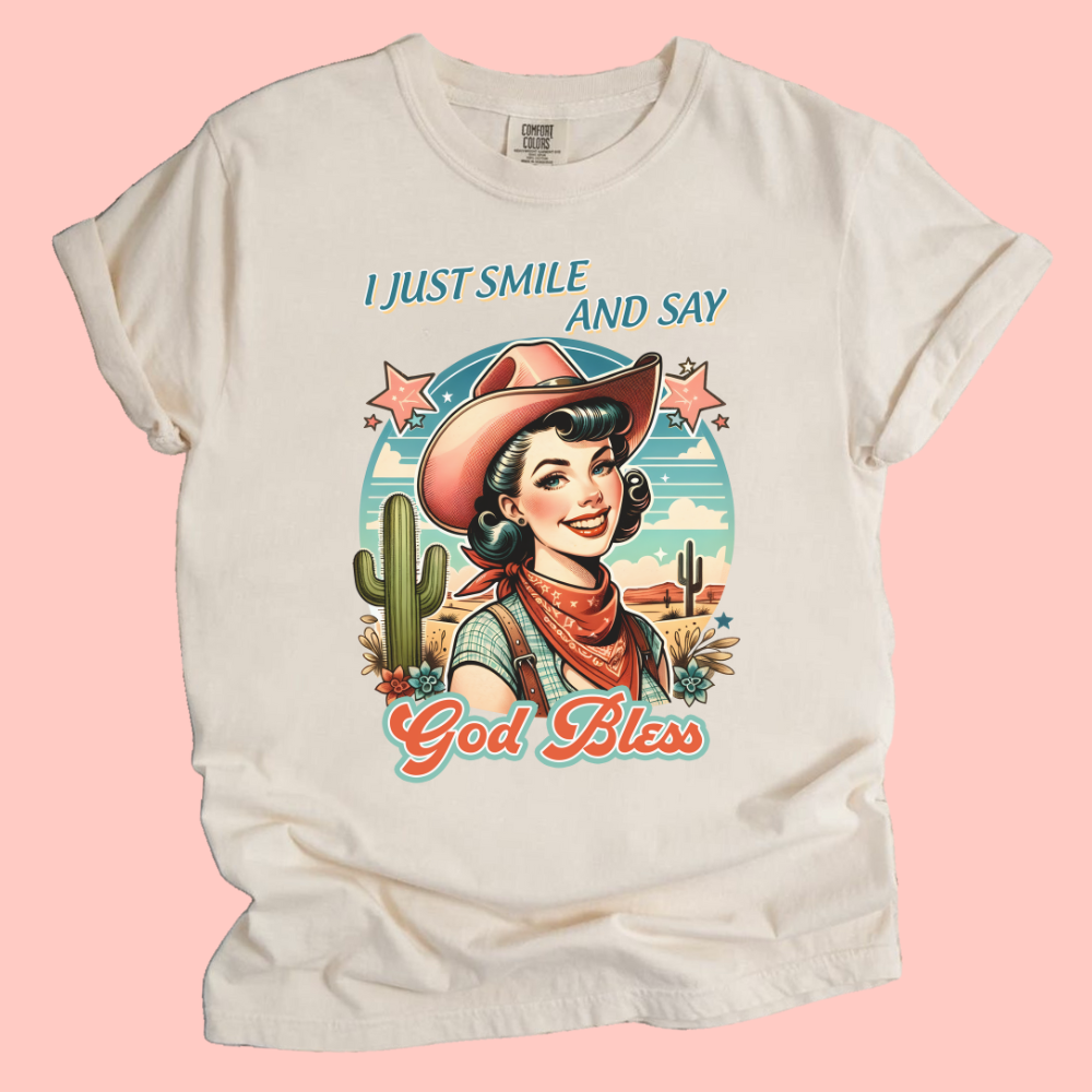 I JUST SMILE AND SAY GOD BLESS TEE - FANGIRL SWAG