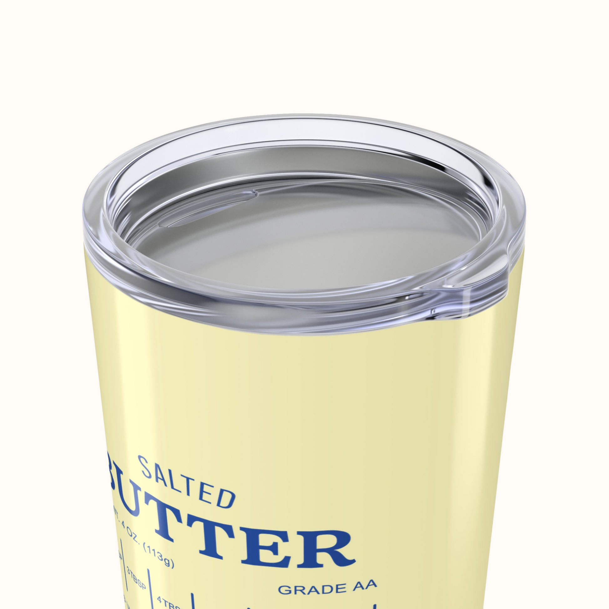 Yellow tumbler with 'Salted Butter' text on a white background