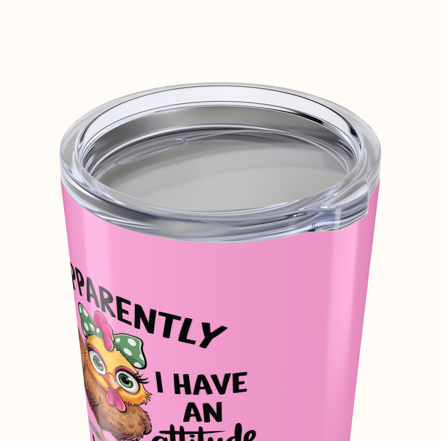 Pink tumbler with a cartoon character and text on a white background