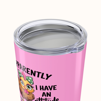 Pink tumbler with a cartoon character and text on a white background
