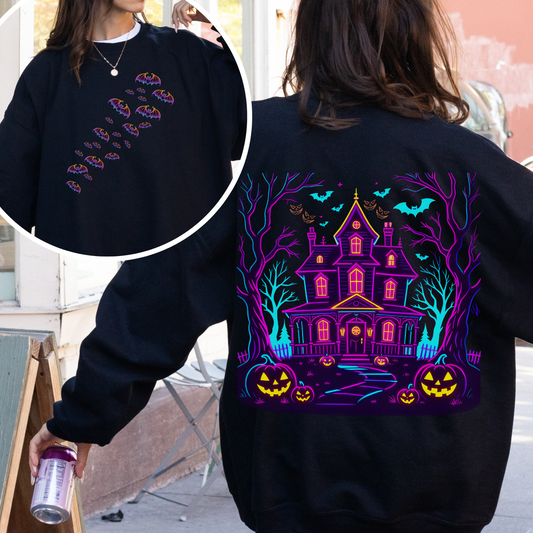 Black sweatshirt with Halloween-themed design on front and back, worn by a person.